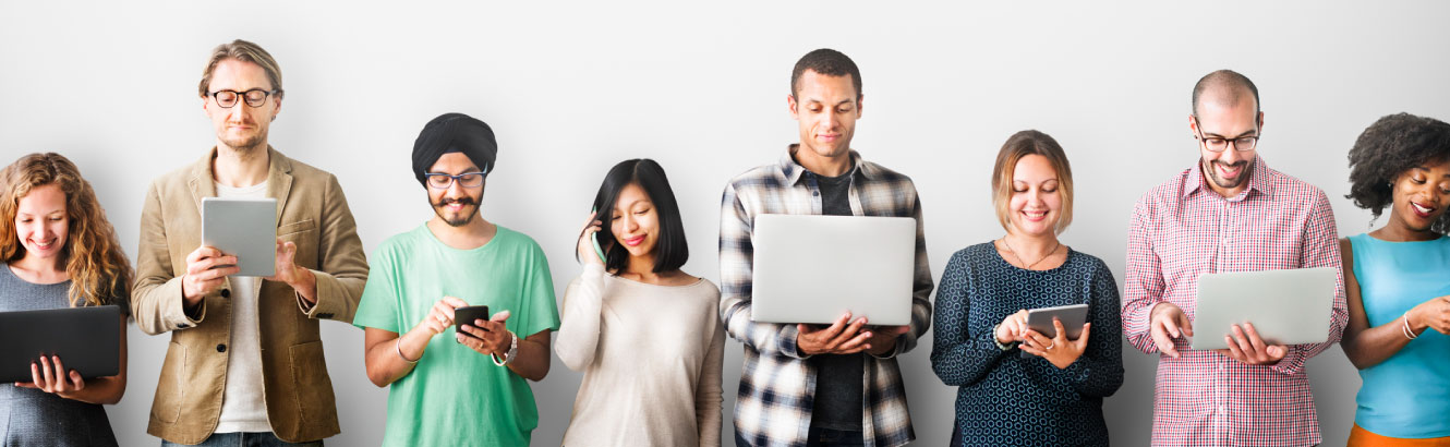 Group of people using their technology devices.